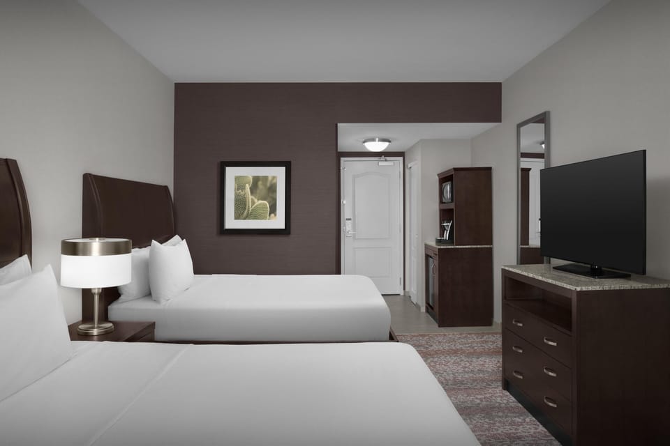 Room, 2 Queen Beds | Hypo-allergenic bedding available, in-room safe, blackout drapes