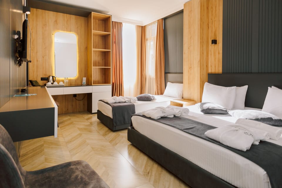 Family Room, 1 Bedroom, Non Smoking | Minibar, in-room safe, desk, iron/ironing board