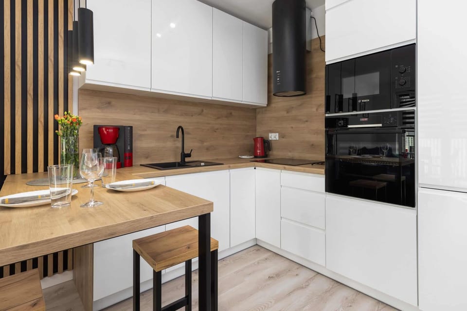 A closer view of the kitchen showcasing the counter space and contemporary design.
