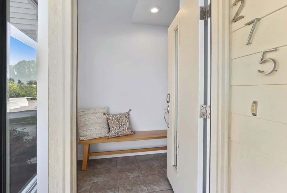 When you enter through the front door, you'll be greeted by garage access and our entry way!
