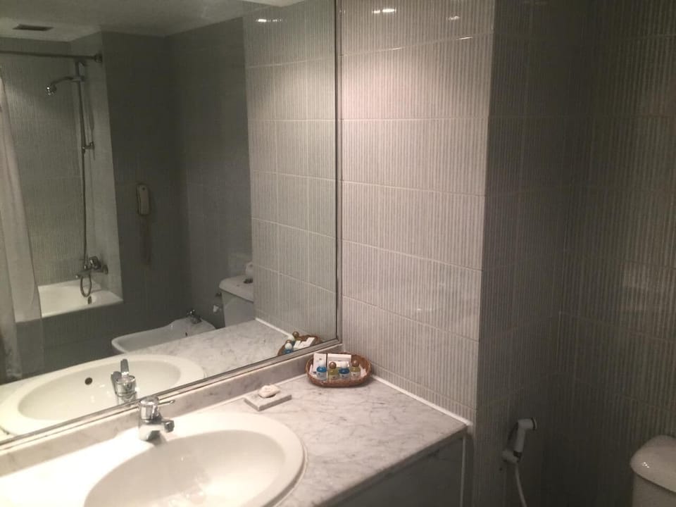 Deep soaking tub, rainfall showerhead, hair dryer, towels