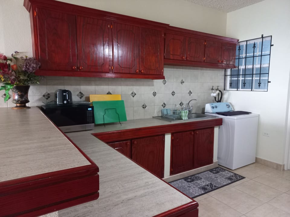 Kitchen with fully functioning washing machine