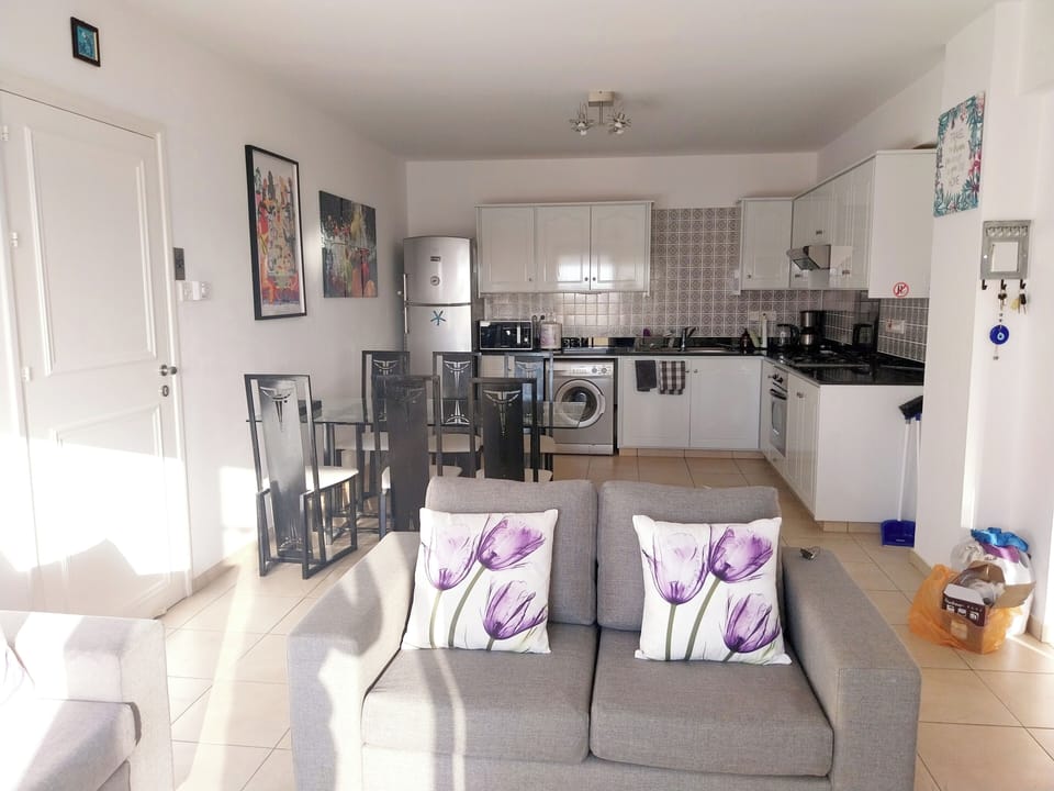 Bright, spacious living room open plan to the equally spacious kitchen area