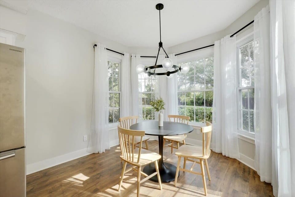 This breakfast nook is the perfect spot for your morning coffee as the soft morning sunlight filters in gently from the surrounding windows.