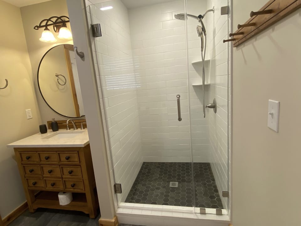 Jack and Jill bathroom with large shower.