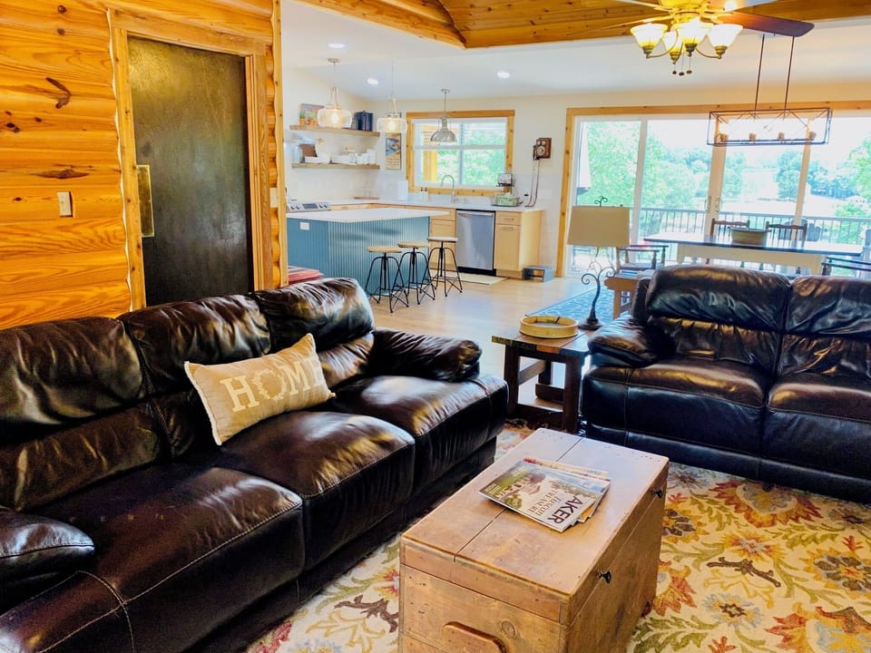 Great room opens to kitchen and dining room.