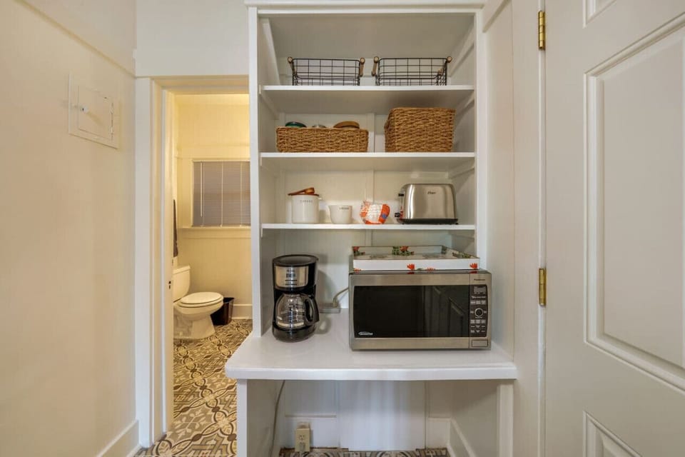 Kitchen`s coffee station is loaded with regular and decaf coffee and tea.