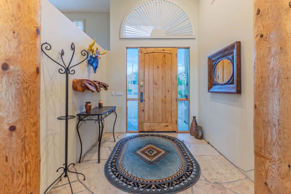 The front entrance hints at what lies beyond in our stylish and rustic-chic desert getaway.