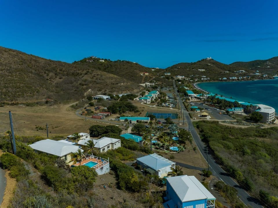 Drone Footage view of Villa Sunrise! Beach is across the street!