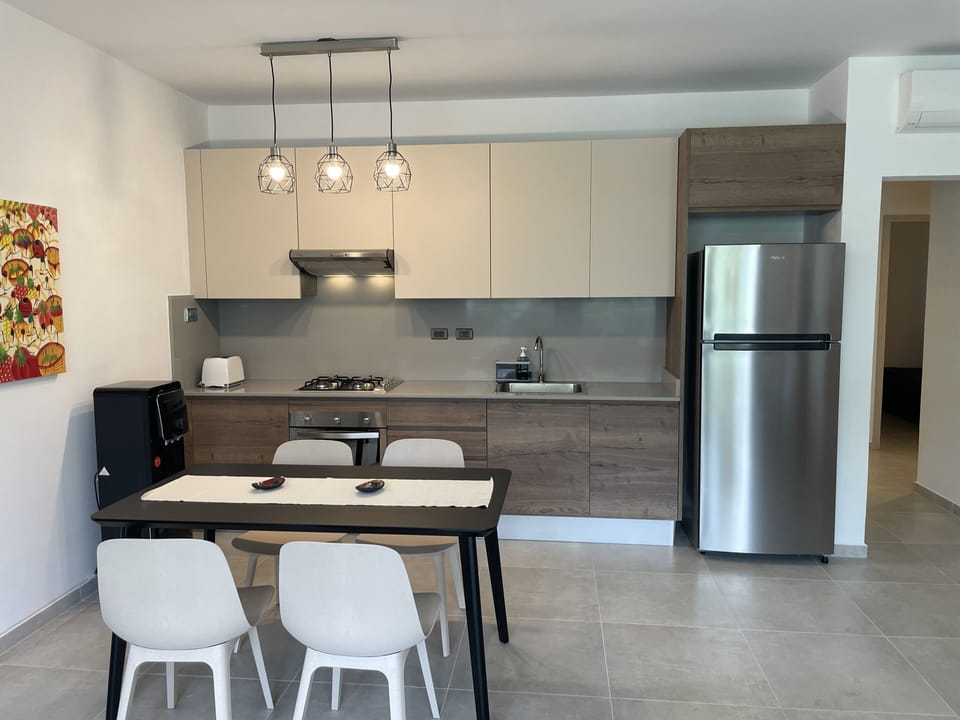 Comfort Apartment, 2 Bedrooms, Pool Access, Pool View | Private kitchen | Full-size fridge, oven, stovetop, toaster