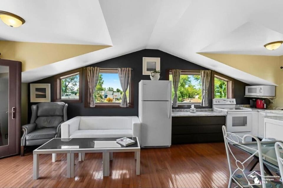 Living area with TV and kitchen