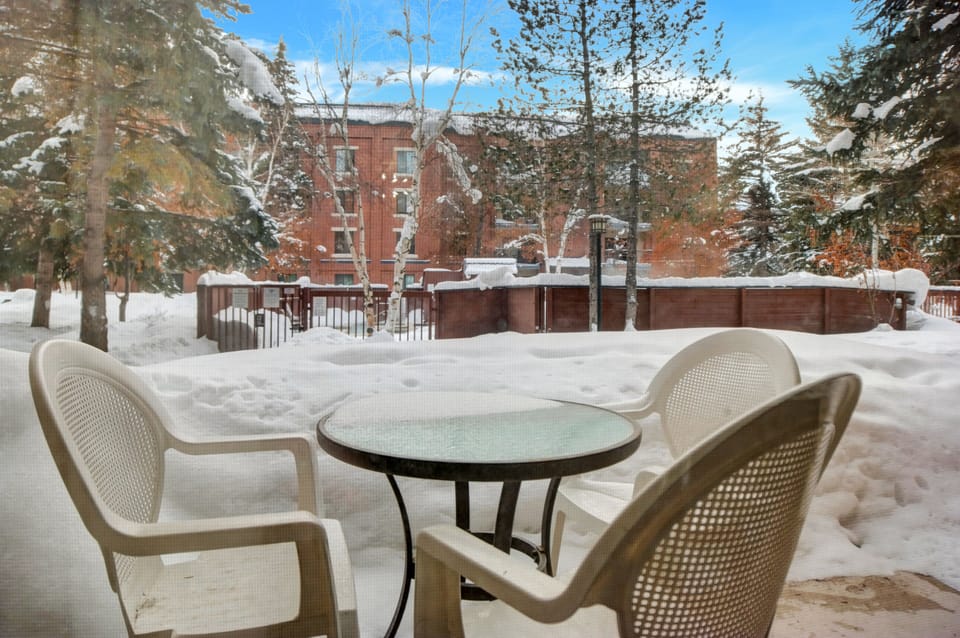 Patio is steps to hot tub and pool