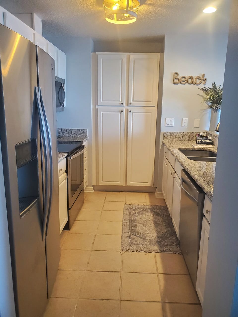 Fully equipped kitchen with views of the bay