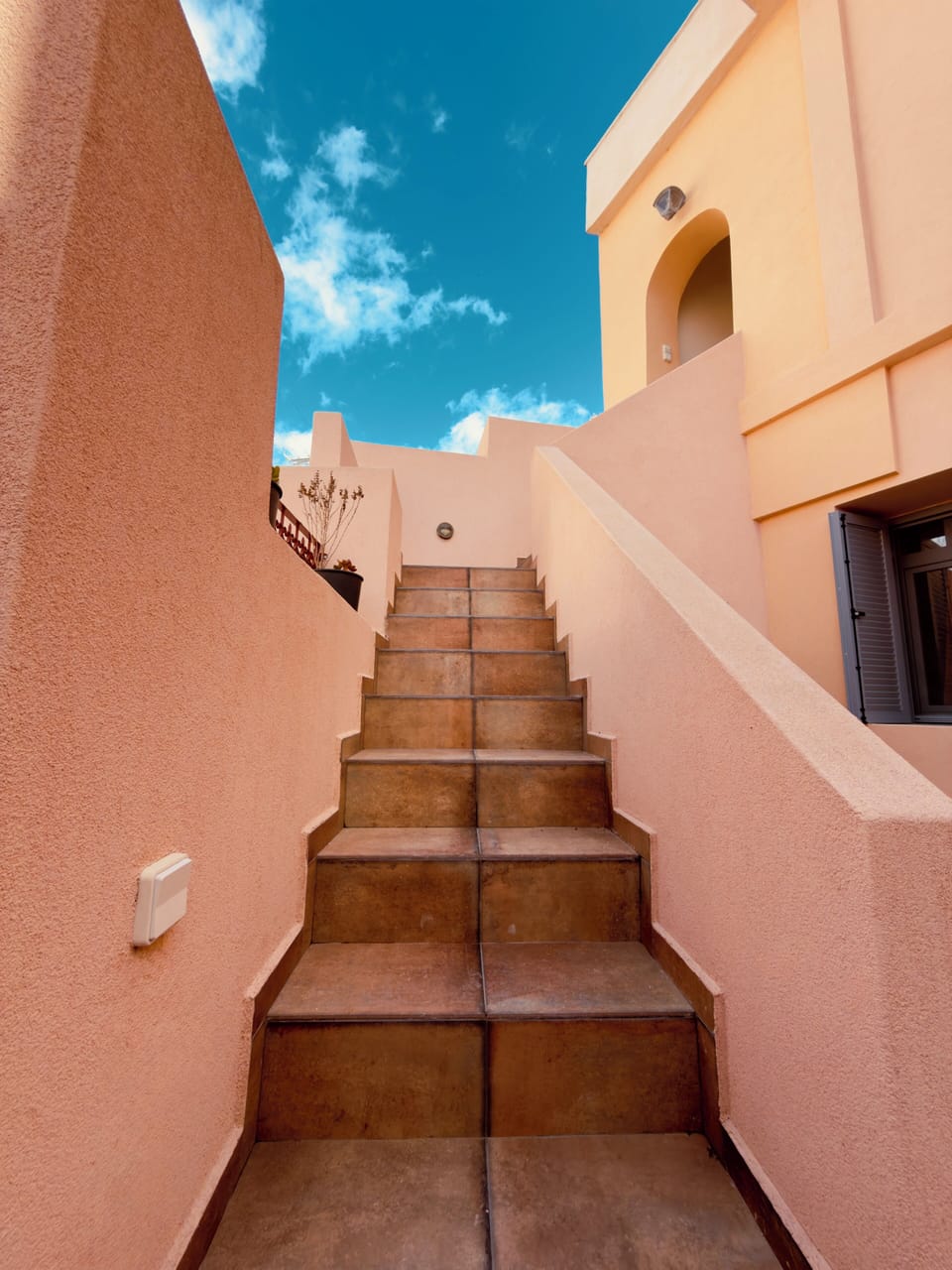 Stairs to the first (top) floor of the building