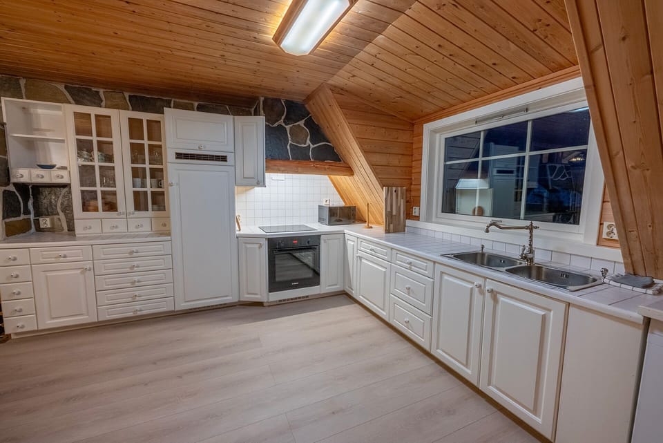 Superior Rorbu Suite with Seaview | Private kitchen | Fridge, stovetop, coffee/tea maker, electric kettle