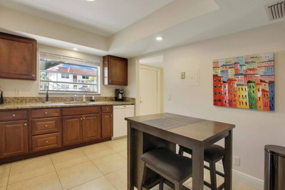 Whip up a feast in our fully equipped kitchen!  Enjoy a quick bite or morning coffee at the convenient bar seating. ☕