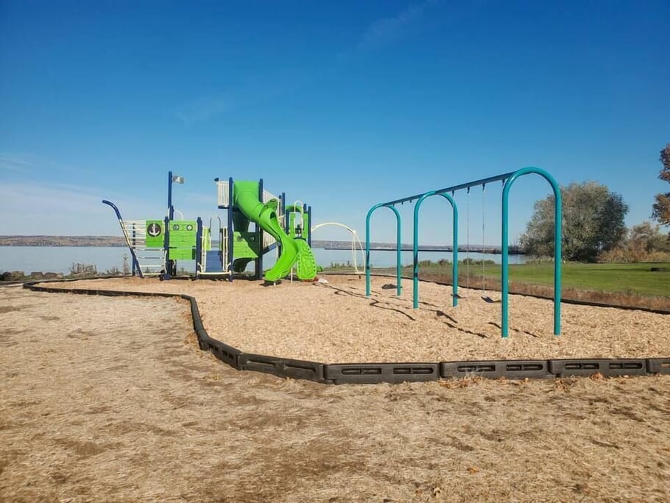 Bring your kids to the nearby playground, right on the lake.