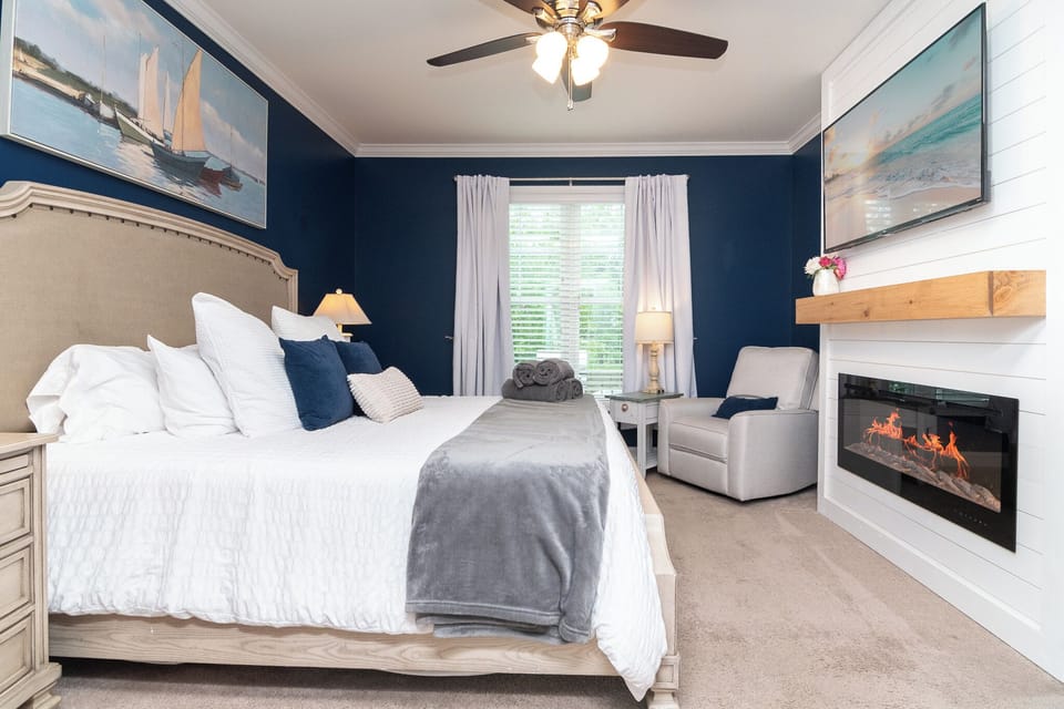 The electric fireplace in the 1st floor King bedroom adds a romantic atmosphere.