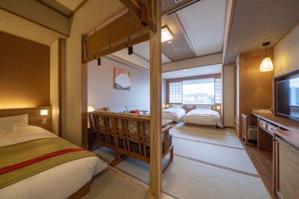 Quadruple Room, Multiple Beds, Non Smoking (with shower only, no bathtub) | In-room safe, desk, iron/ironing board, free WiFi