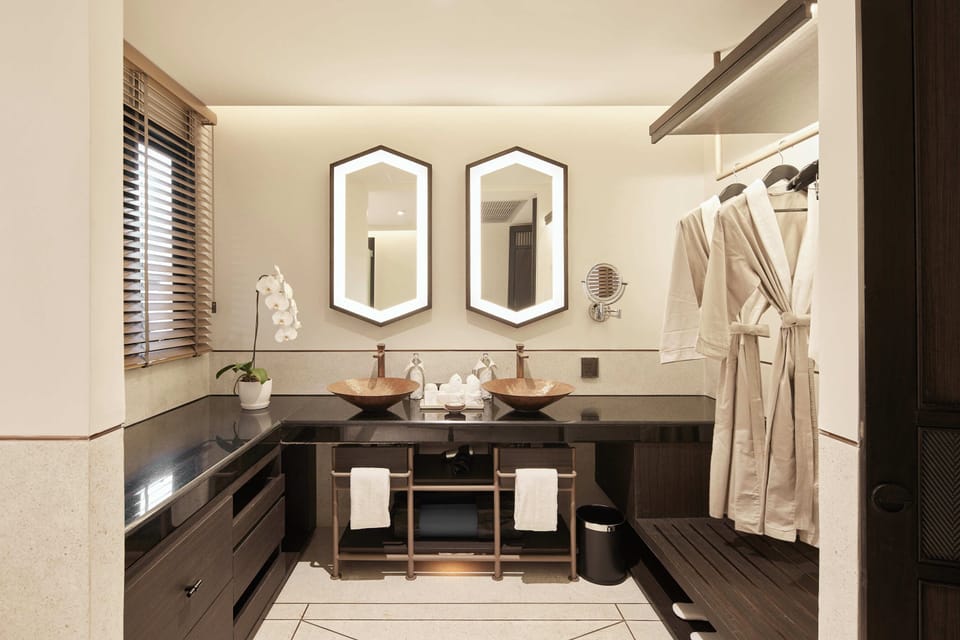 Eco-friendly toiletries, hair dryer, bathrobes, slippers