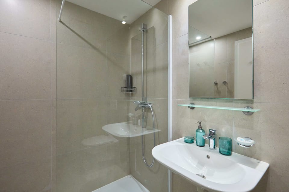 Shower, free toiletries, hair dryer, heated floors