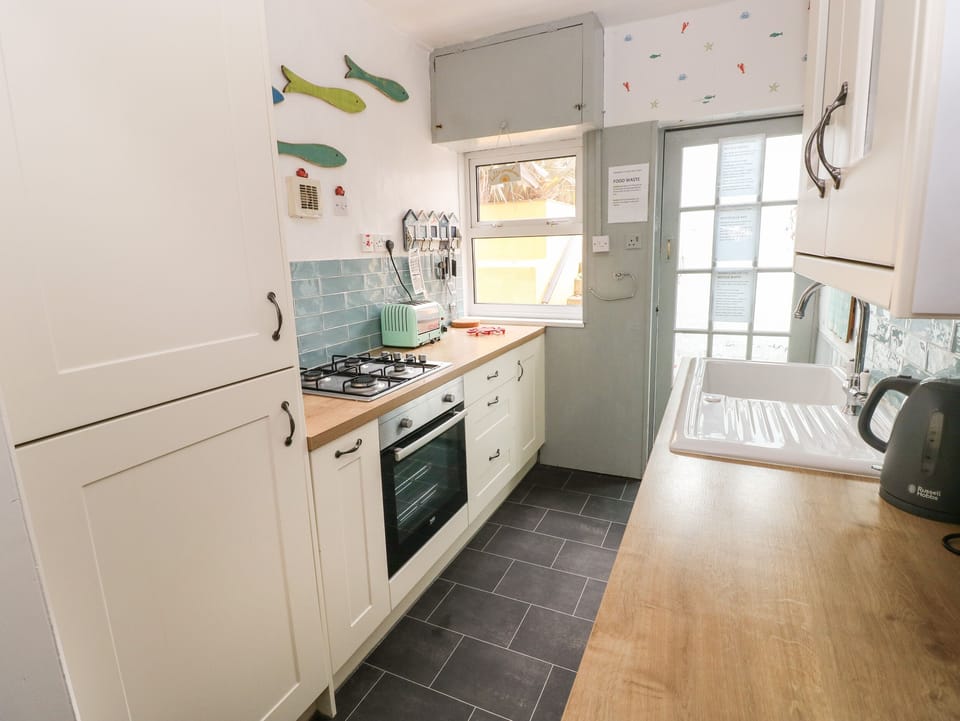 Fridge, dishwasher, electric kettle, toaster
