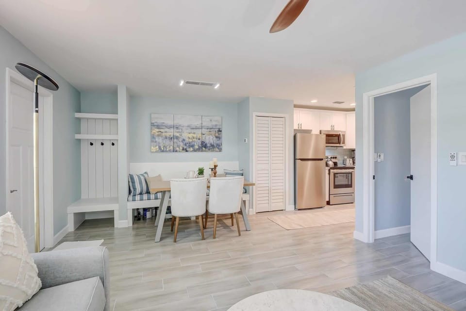 A View To the Bedroom in the Middle Right and the Kitchen in the Far Right