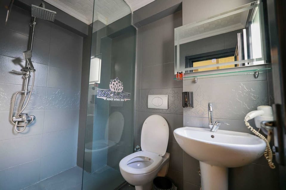 Shower, rainfall showerhead, eco-friendly toiletries, hair dryer