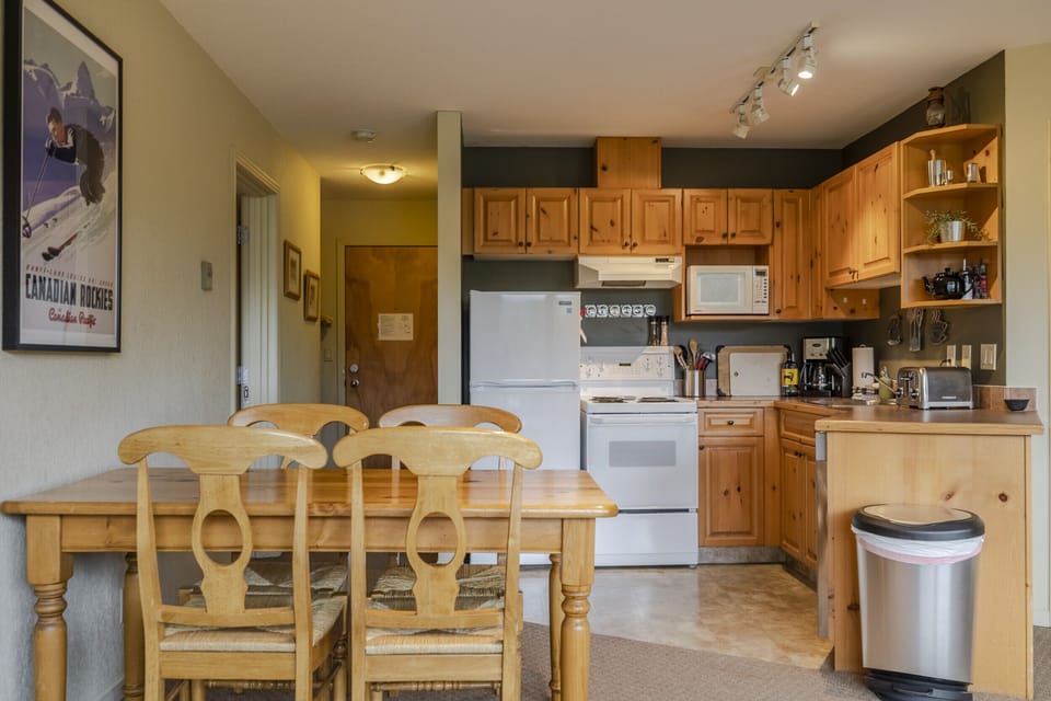 The dining room table can fit six guests comfortably