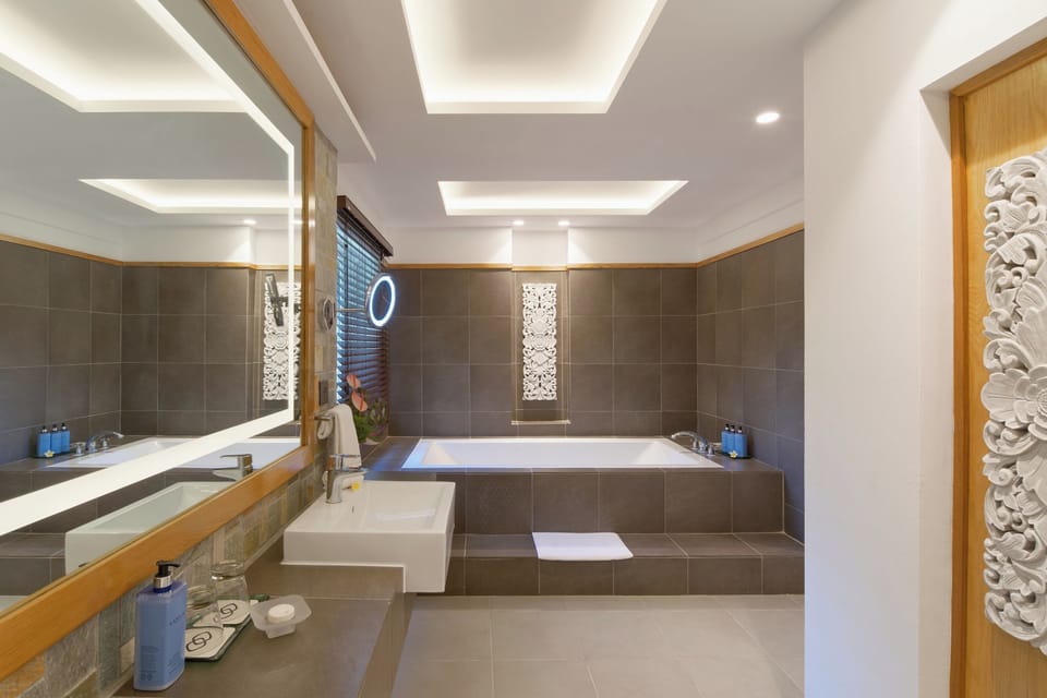 Suite, 1 King Bed, Balcony, Ocean View (Direct Beach Access) | Bathroom | Separate tub and shower, deep soaking tub, designer toiletries