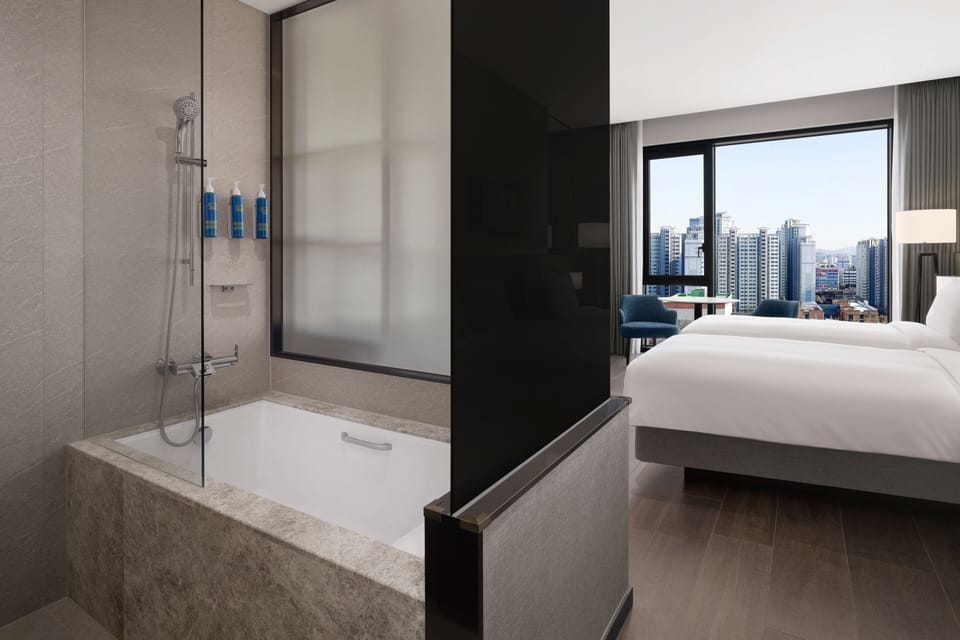 Premier Room, 2 Twin Beds, Park View | Bathroom | Hair dryer, slippers, bidet, towels
