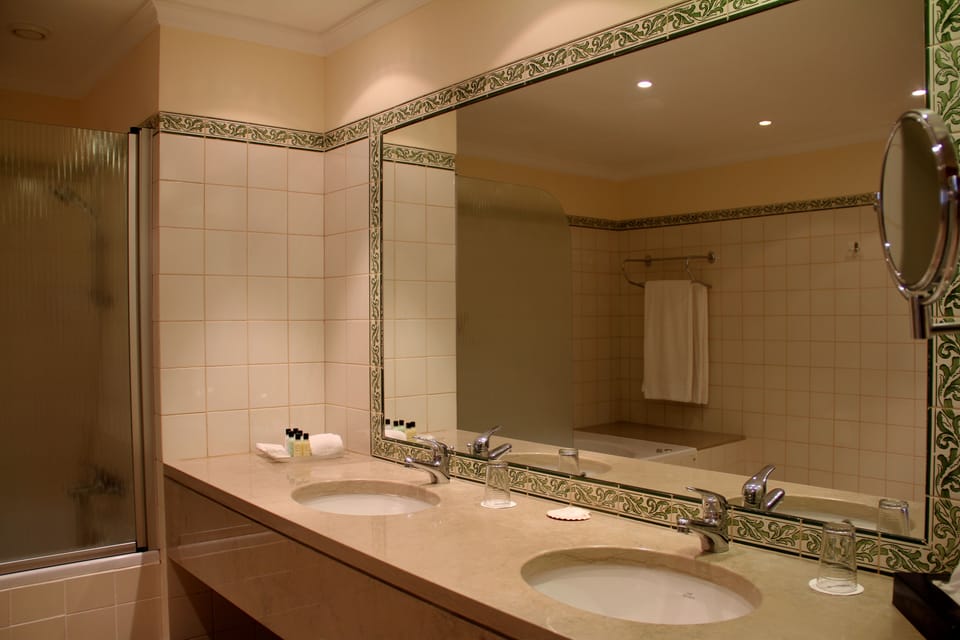 Combined shower/tub, hair dryer, bathrobes, slippers