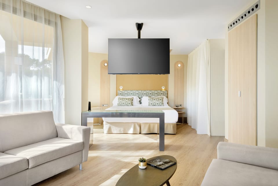 Junior Suite, Sea View | In-room safe, laptop workspace, blackout drapes, iron/ironing board