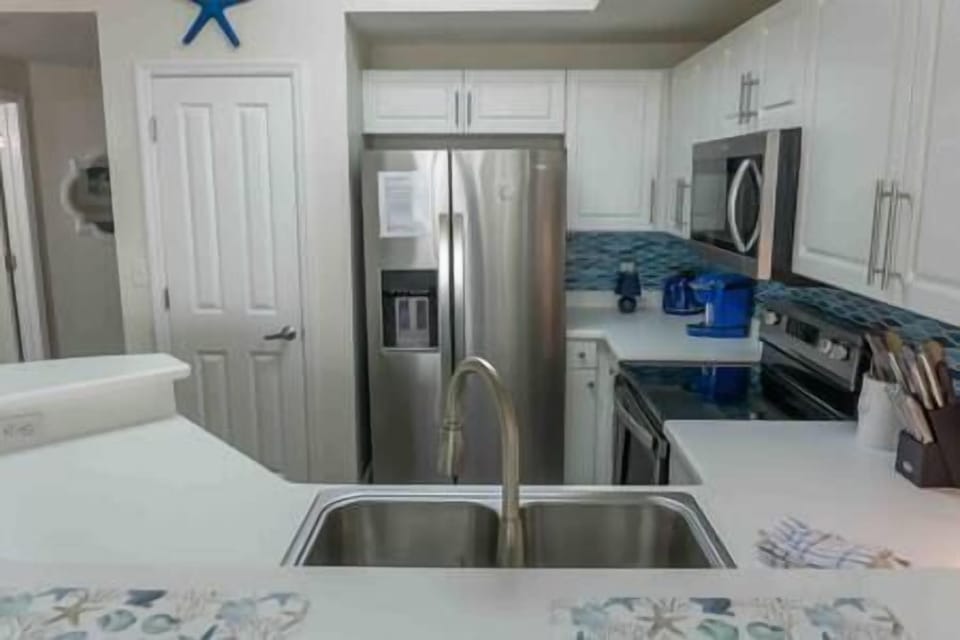 Fully Stocked Kitchen with Stainless Appliances