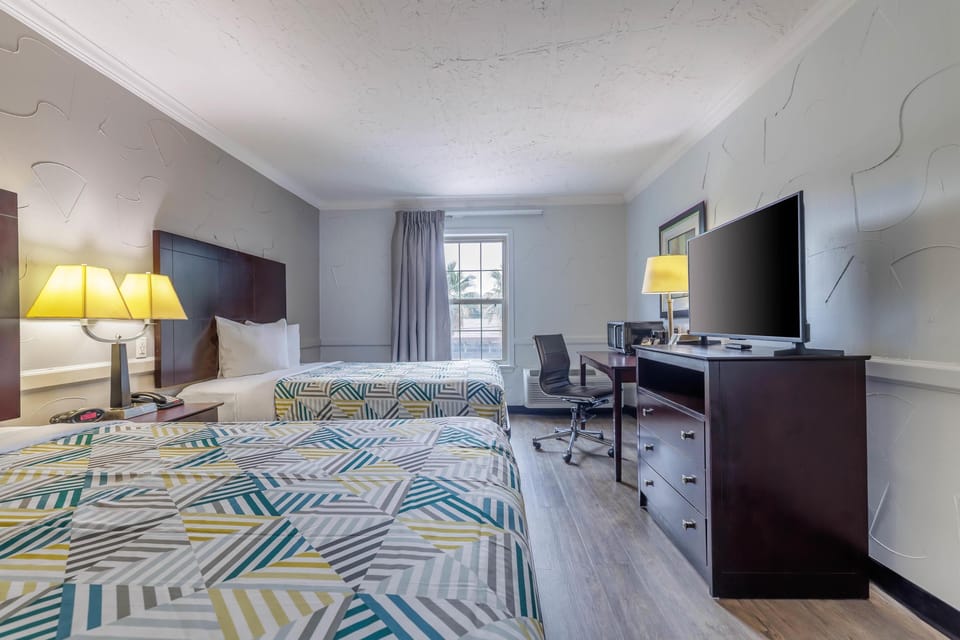 Standard Room, 2 Queen Beds, Non Smoking | Desk, WiFi (free), individually decorated, individually furnished