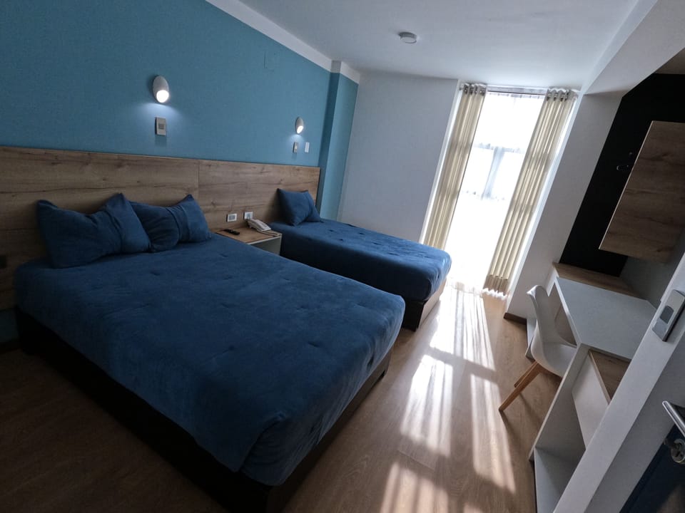 Family Triple Room | Desk, free WiFi, bed sheets