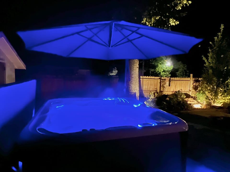 Hot tub: mood lighting, remote controls, and salt water system. Top of the line