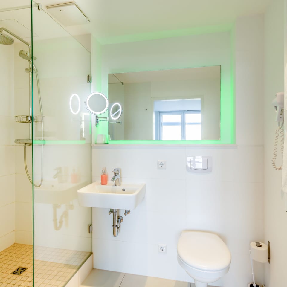 Rainfall showerhead, hair dryer, towels, soap