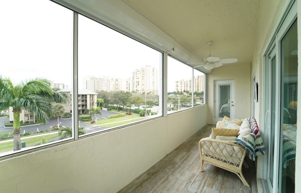 New porcelain tile in lanai with sofa and coffee table for your enjoyment