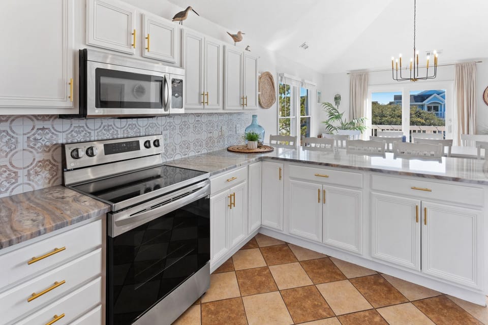 Impress the whole family when you create a delicious meal of local seafood in the Kitchen which boasts plenty of convenient appliances and 2 dishwashers.