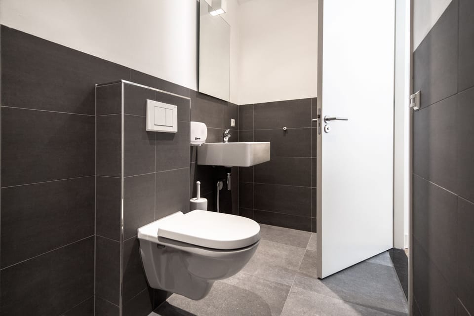 Basic Quadruple Room (The Blue House Downstairs) | Bathroom | Hair dryer, towels