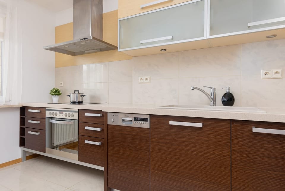 A fully functional kitchen with modern appliances and ample counter space.
