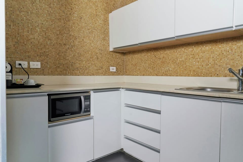 Suite, 2 Bedrooms, City View | In-room safe, desk, laptop workspace, blackout drapes
