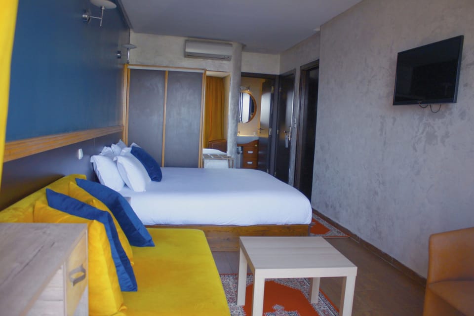 Junior Suite, Terrace | Minibar, in-room safe, desk, blackout drapes