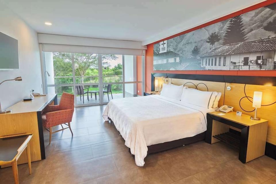 Premium bedding, down comforters, minibar, in-room safe