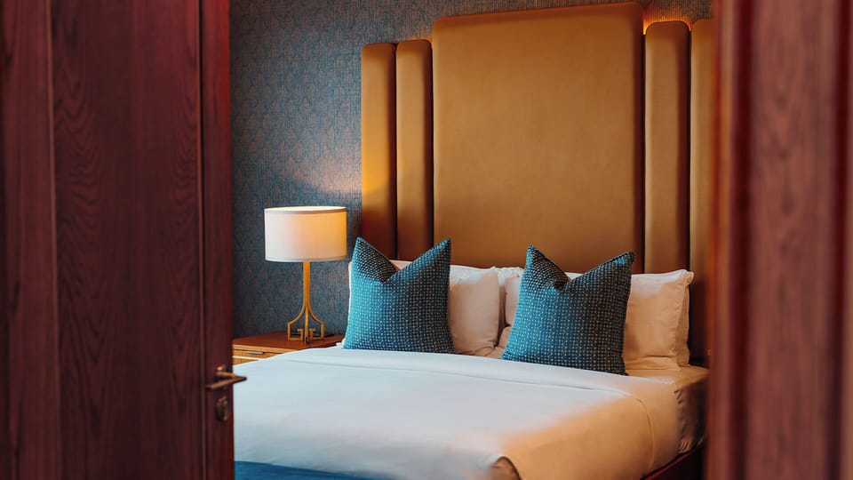 Down comforters, memory foam beds, in-room safe, desk