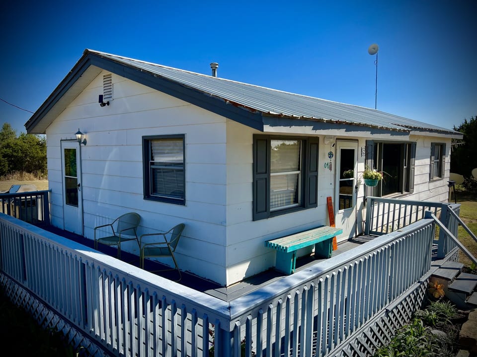 Wrap round stargazing deck w/ separate grilling deck & large private back yard.