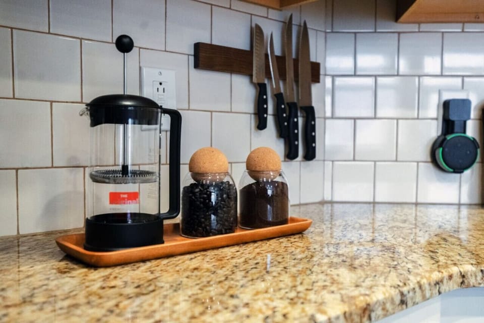 Multiple coffee options with fresh local beans to grind