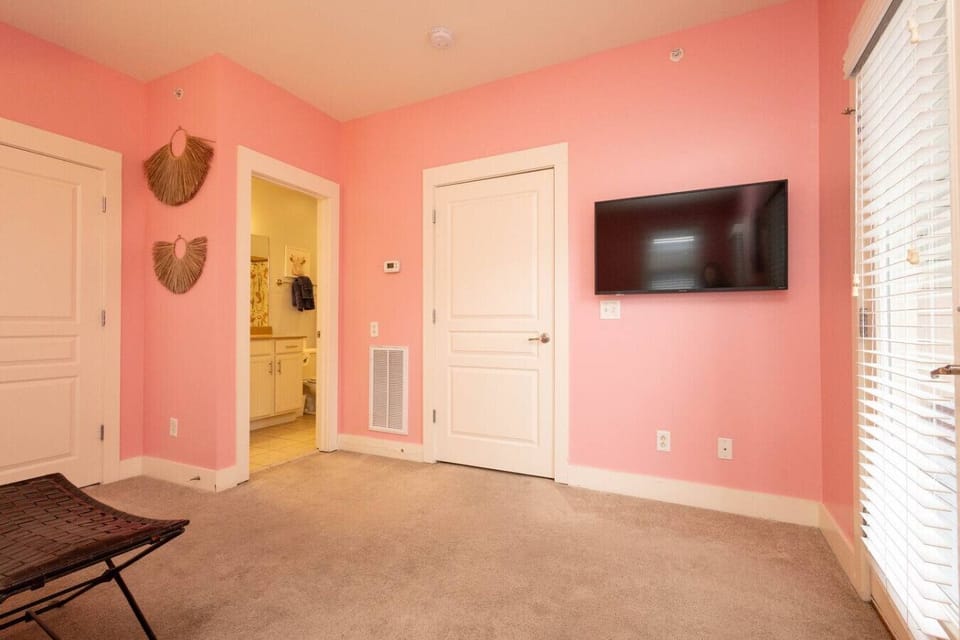 Spacious layout with a flat-screen TV and direct access to the en-suite bathroom