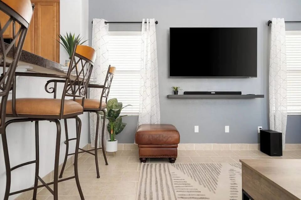 Bar in the living room offers more seating and an open floorplan while cooking!
